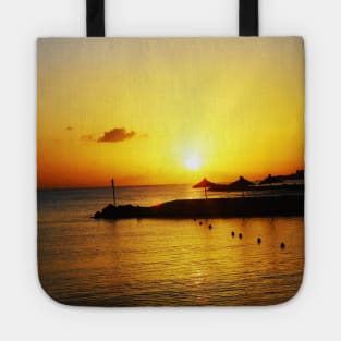 Beautiful orange sunset by the ocean photo Greece Tote