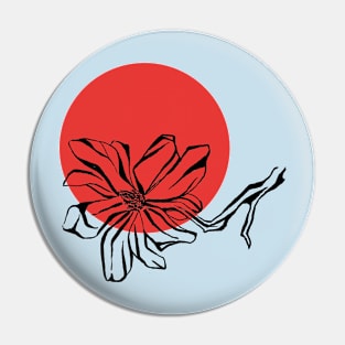 Magnolia flower on red circle Pin