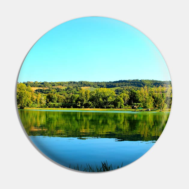 View from Lago Cedri in Lapedona with the surface of water extending over the picture and reflecting vegetation Pin by KristinaDrozd