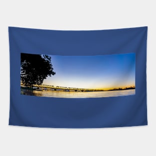 Tauranga's historic railway bridge panorama silhouetted by golden sunrise Tapestry