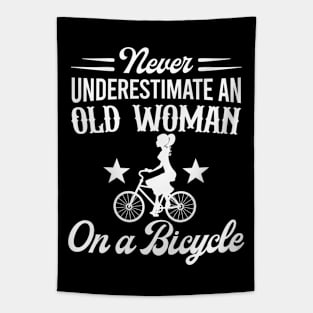 Never Underestimate An Old Woman On A Bicycle Tapestry