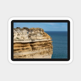 Layered limestone cliff at Loch Ard Gorge, Australia. Magnet