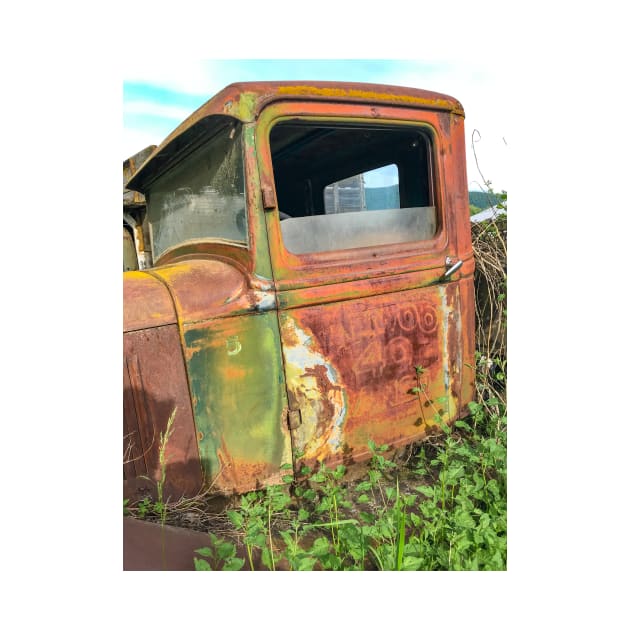 Resting and peacefully rusting in a field by Steves-Pics