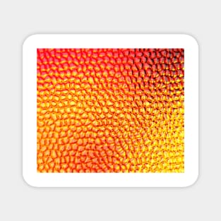 orange pattern in the style of fire behind profiled glass Magnet