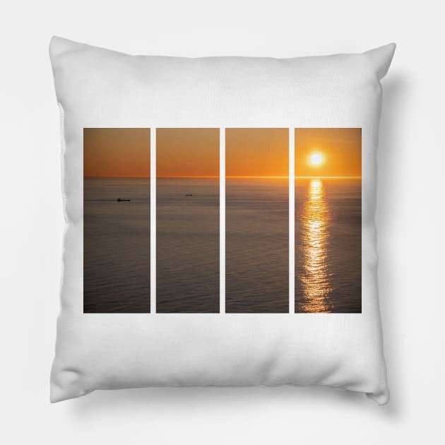 Wonderful landscapes in Norway. Nord-Norge. Beautiful scenery of a midnight sun sunset at Nordkapp (Cape North). Boat and globe on a cliff. Rippled sea and clear orange sky. Pillow by fabbroni-art