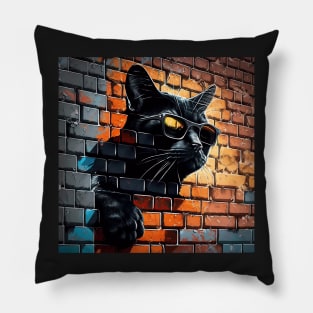 Black cat in sunglasses painted onto brick wall Sticker Pillow