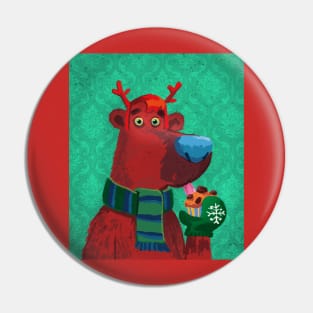 Portrait of a bear with Christmas reindeer antlers and a muffin in hand Pin