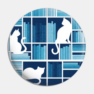 Rainbow bookshelf // monochromatic blue white shelf and library cats Pin