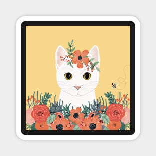 The cute white cat queen is watching you from the flowerbed Magnet