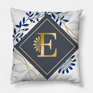 E, blue and gold initial monogram. Pillow