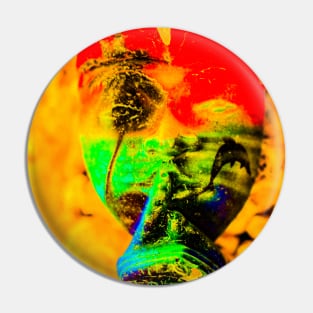 A red green Bali face mask on yellow Pin