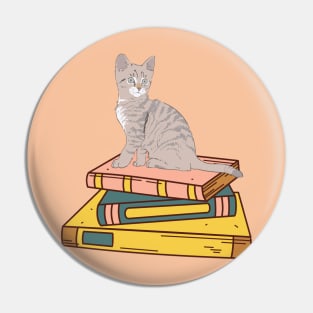 Stack Of Books With A Cat Pin