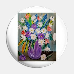 A lovely mixed of colorful flowers in a metallic purple vase Pin