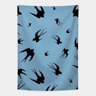 Flying swallows  silhouettes pattern on pale blue background Tapestry