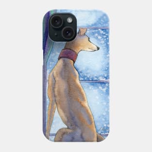 A greyhound dog admires the snowfall from his nice warm seat inside Phone Case