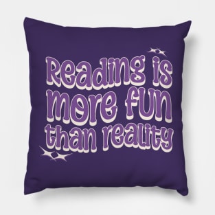 READING IS MORE FUN THAN REALITY - Purple Text Pillow