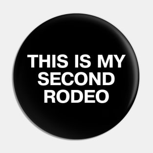 "THIS IS MY SECOND RODEO" in plain white all caps letters - cos you're not the noob, but barely Pin