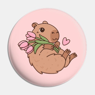 Cute capybara with flowers Pin