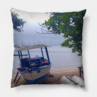 Boats stopped at the beach on a rainy day Pillow