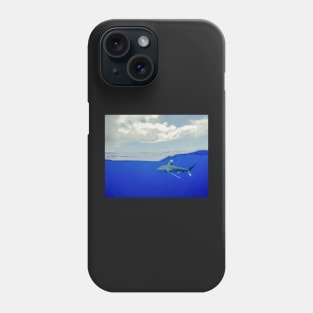 An Oceanic White Tip Shark Cruising Under the Clouds in the Bahamas Phone Case