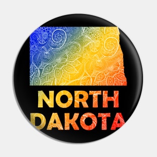 Colorful mandala art map of North Dakota with text in blue, yellow, and red Pin