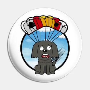 Silly black dog has a broken parachute Pin