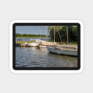 Boats moored on Hickling Broad in the Norfolk Broads National Park Magnet