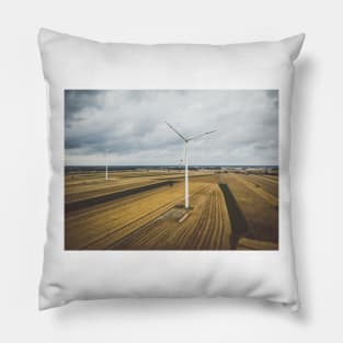 Aerial view of two windmills against cloudy sky Pillow