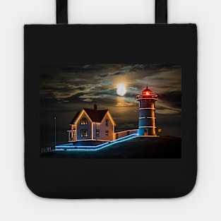 The supermoon rising over the Nubble Lighthouse York Maine Tote