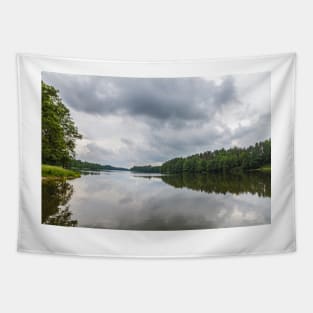 Cloudy sky over calm lake Tapestry