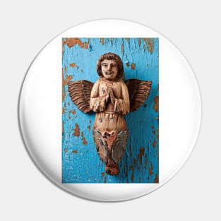 Angel on blue wooden wall Pin