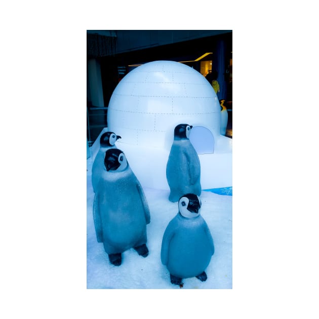 Igloo with a group of penguin sculptures by kall3bu