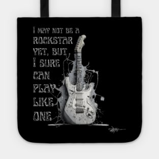 I may not be a rockstar yet, but I sure can play like one. Guitar. Tote