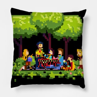 A group of people enjoying a picnic in a park Pillow
