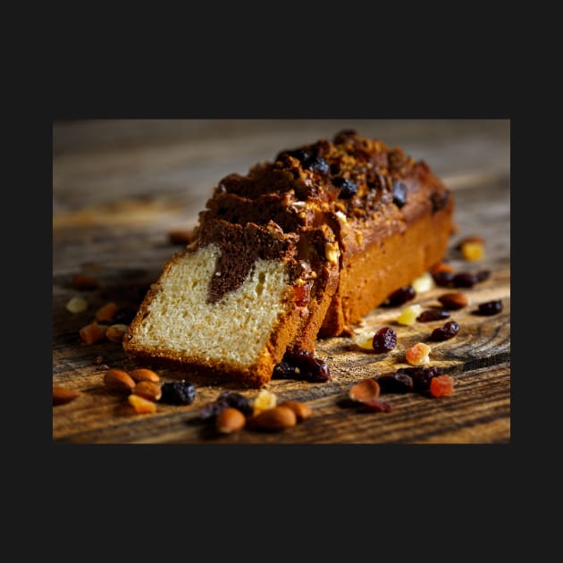 Marbled pound cake on a wooden board by naturalis