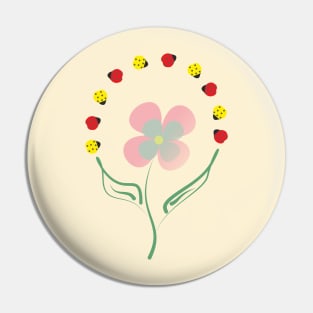 A flower juggling ladybugs Pin