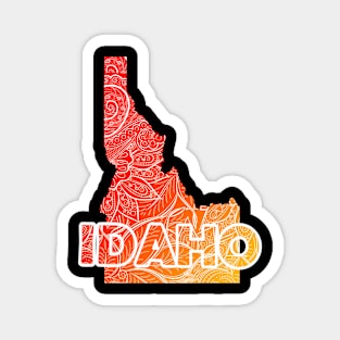 Colorful mandala art map of Idaho with text in red and orange Magnet