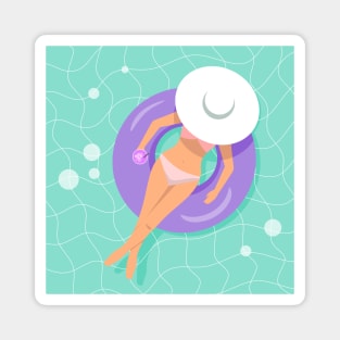 Woman floating on rubber ring with cocktail in her hand Magnet