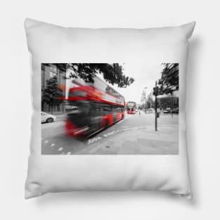 Red double-decker bus on the street of London Pillow