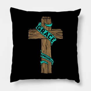 A wooden cross with the inscription "Grace" Pillow