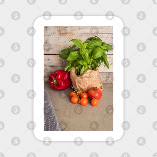 Fresh basil and other ingredients for Italian cuisine. Cherry tomatoes, basil and red pepper Magnet by AnaMOMarques