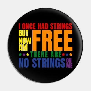 I once had strings but now am free there are no strings on me with pride Pin