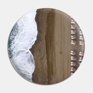 Aerial View of Sandy Beach with Umbrellas and Sea Waves Pin