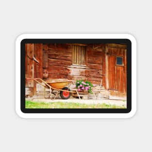 Rusted Wheelbarrow in Front of Wooden Farm House Magnet