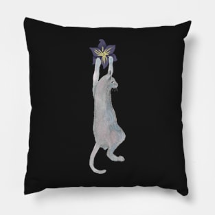 Cat climbing on a flower Pillow