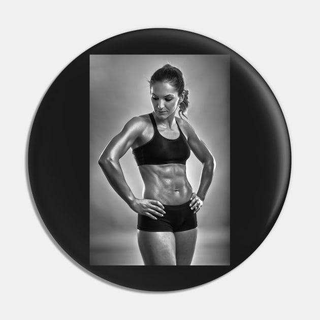 Fitness woman posing in studio Pin by naturalis