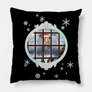 Funny giraffe  with christmas hat looks through the window Pillow