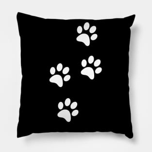 White Paw-prints on a black surface Pillow