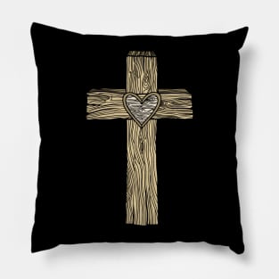 A wooden cross with a heart in the center Pillow