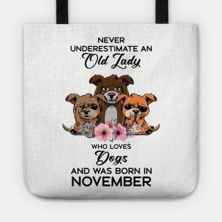 Never Underestimate An Old Woman Who Loves Dogs And Was Born In November Tote